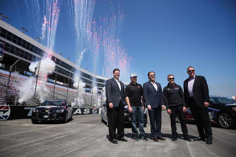 From left: NASCAR executive vice president and chief racing development officer Steve...