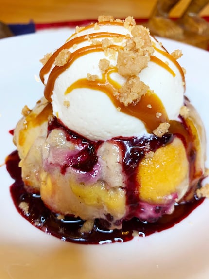 Blackberry bread pudding comes topped with salted caramel drizzle.