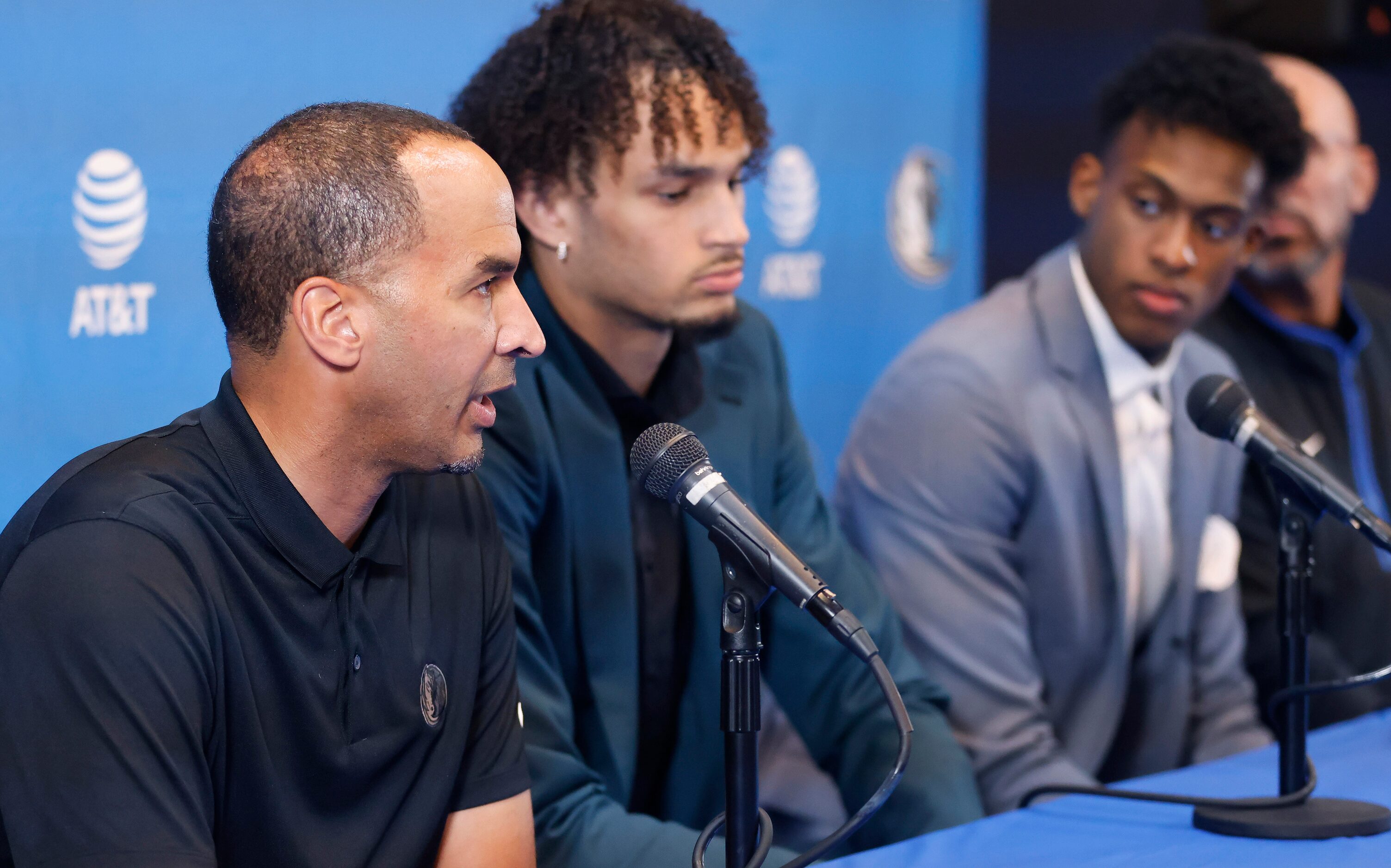 Dallas Mavericks president of basketball operations and general manager Nico Harrison (left)...