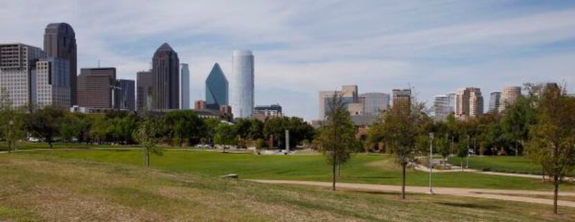 
A berm stretching across the 8-acre Griggs Park helps suppress highway sounds and offers a...