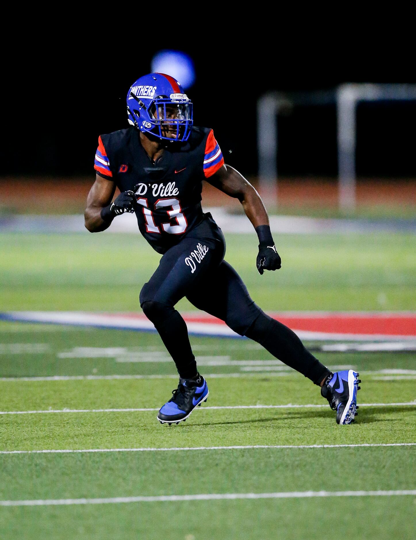 Duncanville junior wide receiver Chris Hicks runs a route during the first half of a high...