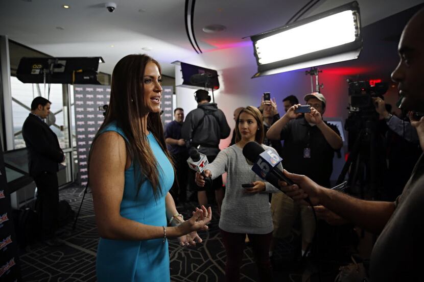 Stephanie McMahon (left), Chief Brand Officer of WWE and wife of WWE wrestler and executive...