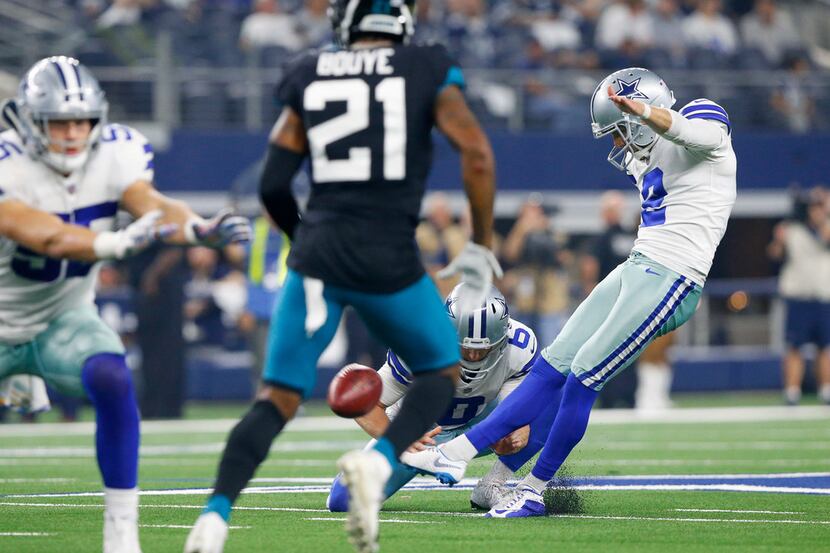 Dallas Cowboys kicker Brett Maher (2) kicks a long fourth quarter field against the...
