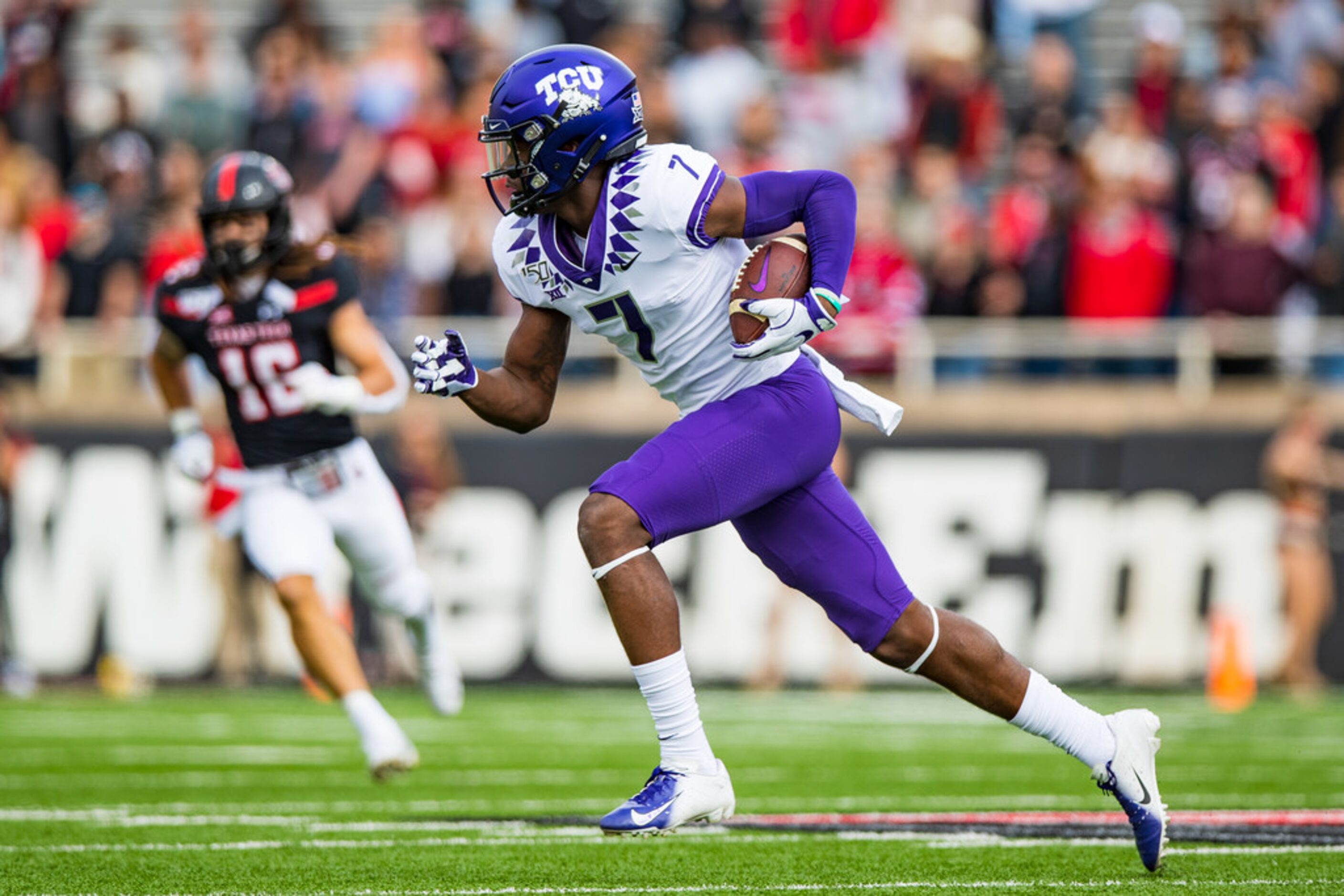 LUBBOCK, TEXAS - NOVEMBER 16: Wide receiver John Stephens Jr. #7 of the TCU Horned Frogs...