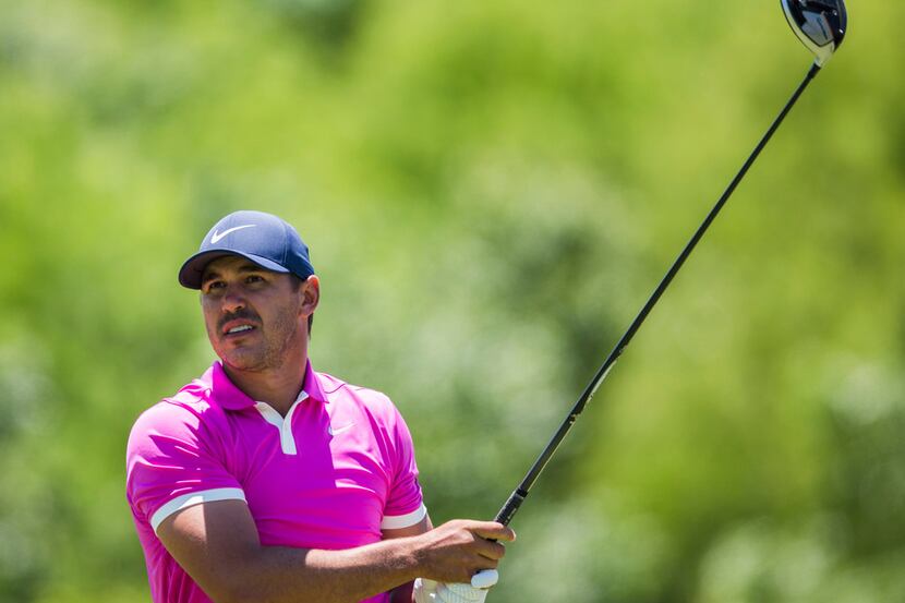 Brooks Koepka tees off a hole 4 during round 4 of the AT&T Byron Nelson golf tournament on...