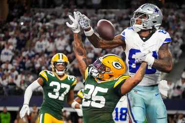 Green Bay Packers cornerback Keisean Nixon (25) breaks up a pass intended for Dallas Cowboys...