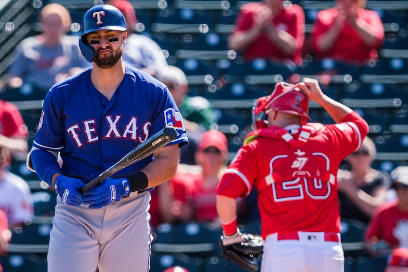 Texas Rangers outfielder Joey Gallo reacts after being called out on strikes during the...