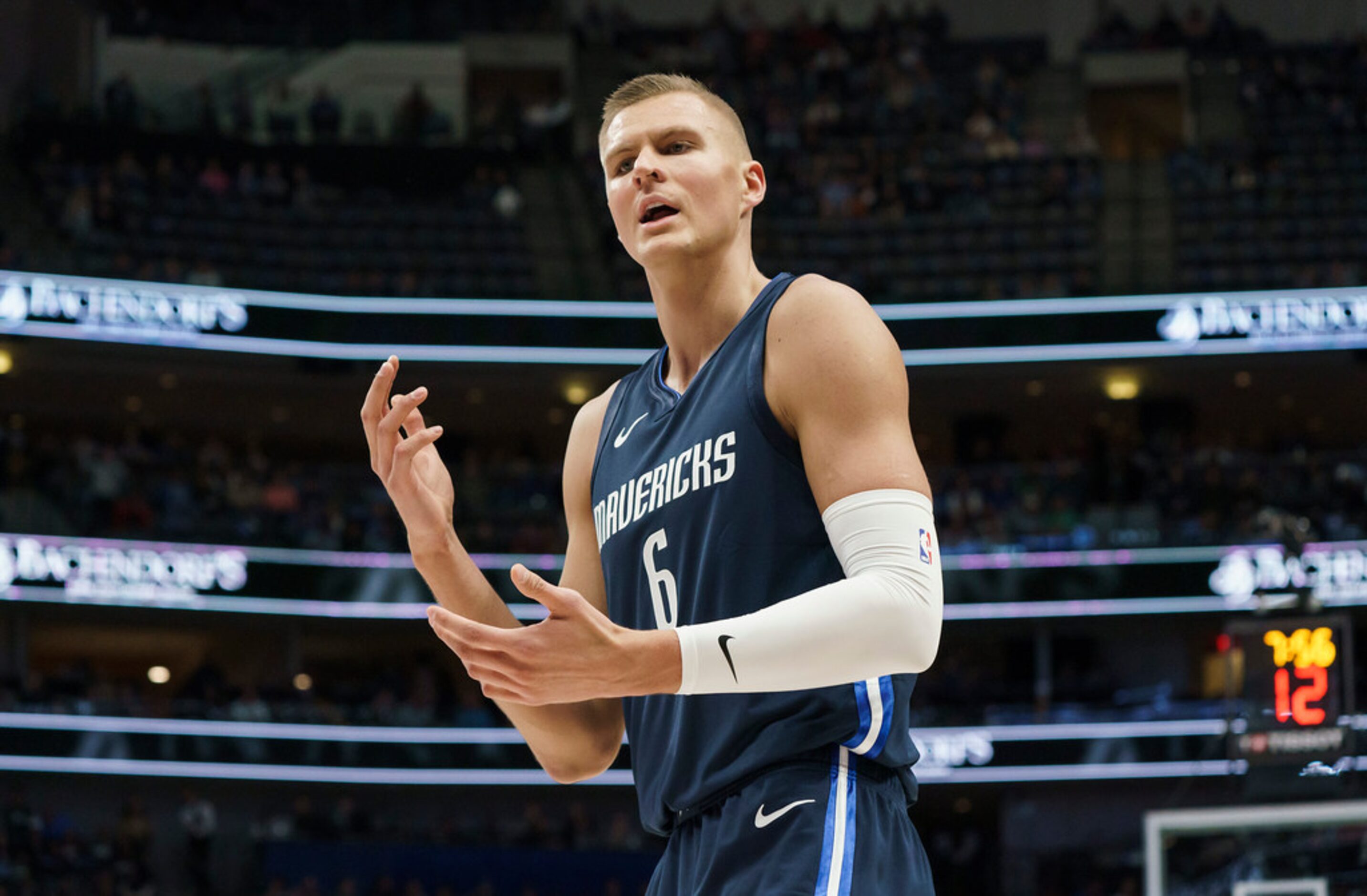 Dallas Mavericks forward Kristaps Porzingis (6) argues for a foul call during the first half...