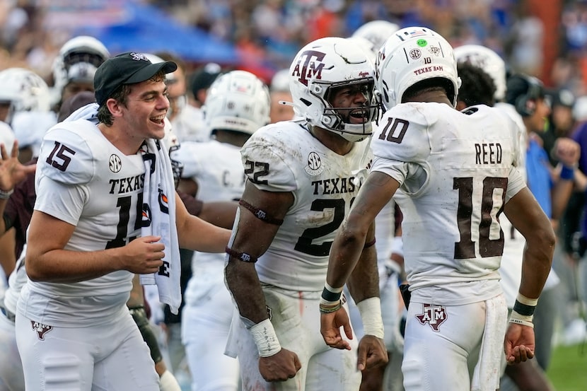 Texas A&M quarterback Marcel Reed (10) celebrates his 1-yard touchdown run against Florida...