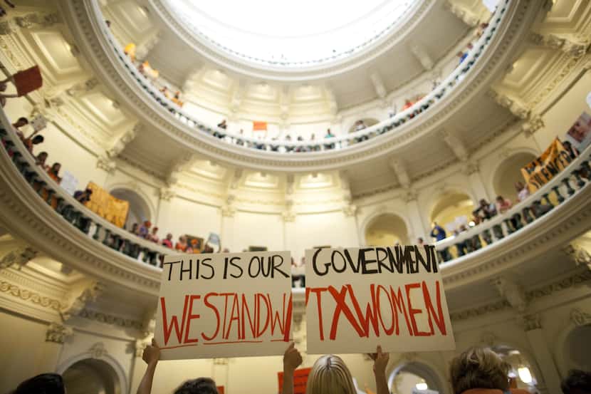 Abortion rights supporters rallied on the floor of the state Capitol in Austin in July. They...
