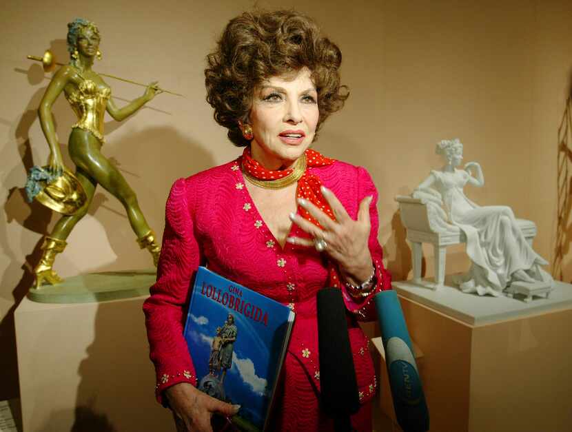 FILE - Italian actress Gina Lollobrigida speaks at the media viewing of the first exhibition...