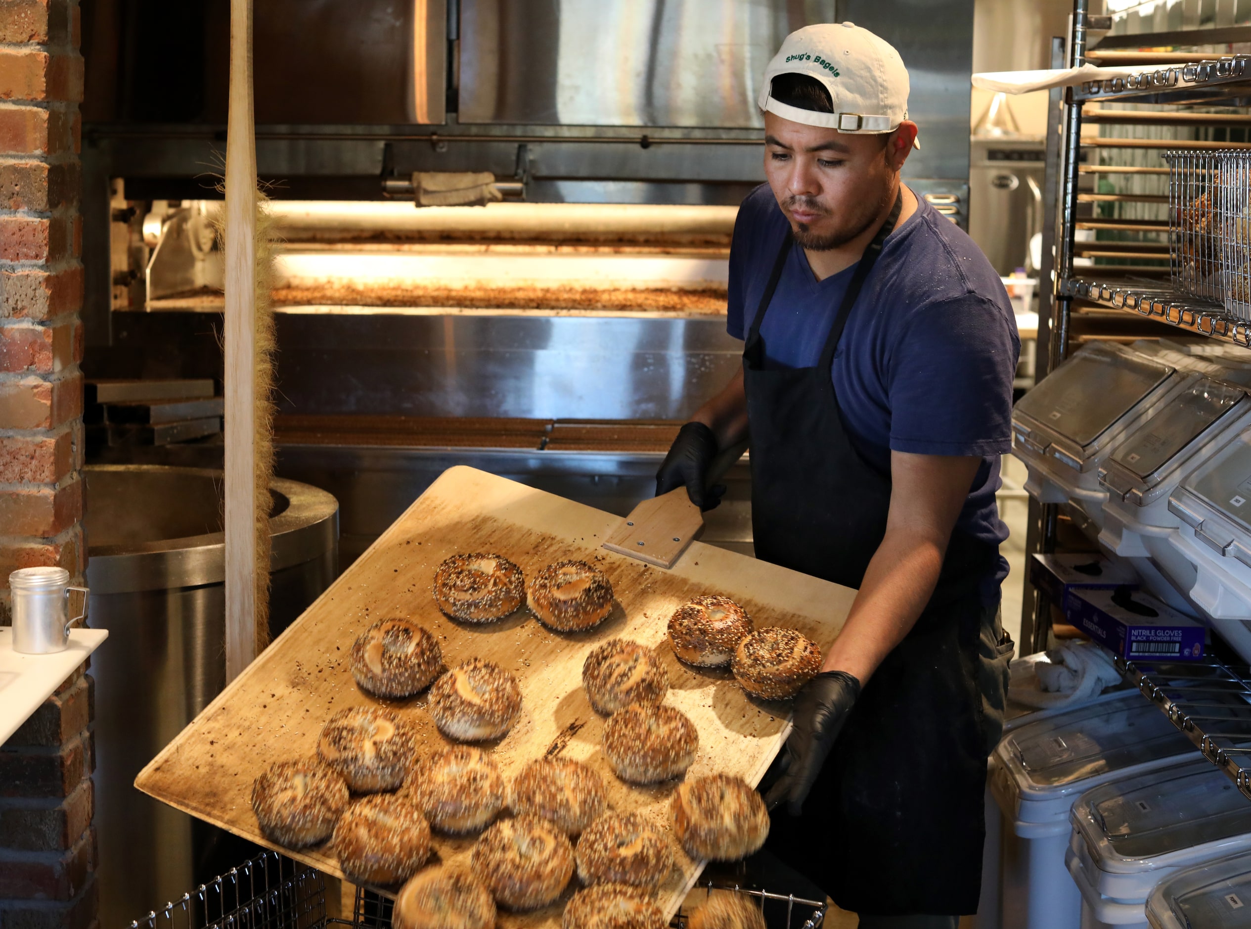 Gilbert Orozco makes bagels at Shug's Bagels in Dallas, TX, on Nov 2, 2023.  (Jason...