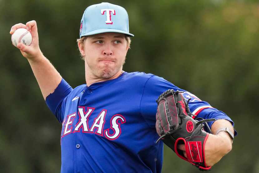 Texas Rangers minor league pitcher Josh Stephan participates in a spring training workout on...