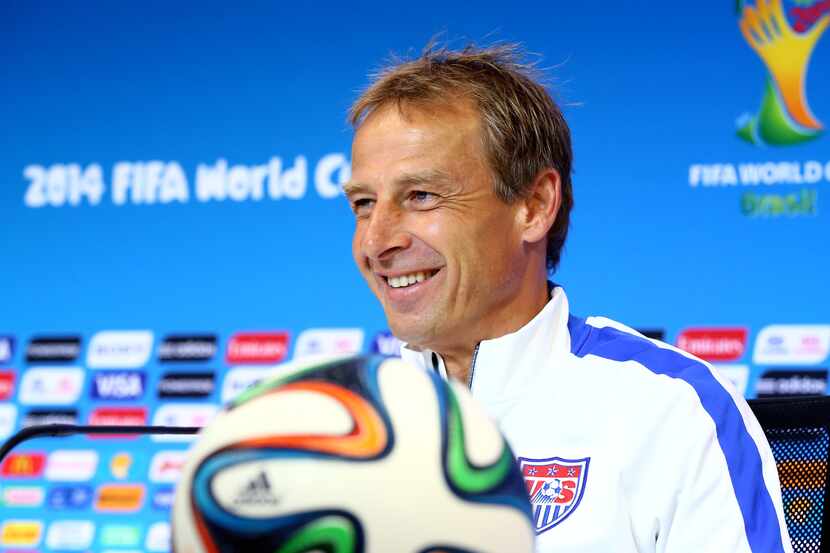 Jun 30, 2014; Salvador, BRAZIL; USA head coach Jurgen Klinsmann smiles as he speaks at a...