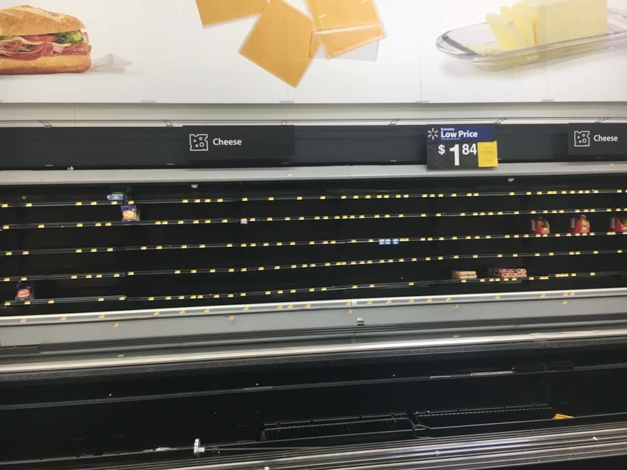 The cheese section of a Walmart Supercenter in Far East Dallas was barren Tuesday.