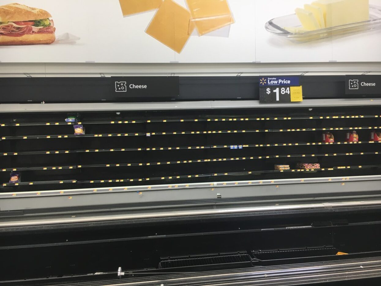 The cheese section of a Walmart Supercenter in Far East Dallas was barren Tuesday.