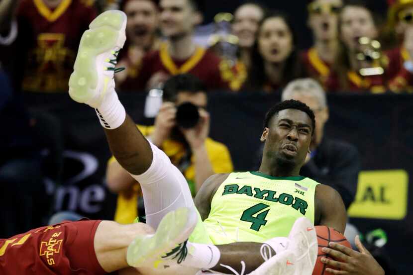Baylor guard Mario Kegler (4) lands on the floor after being fouled by Iowa State forward...