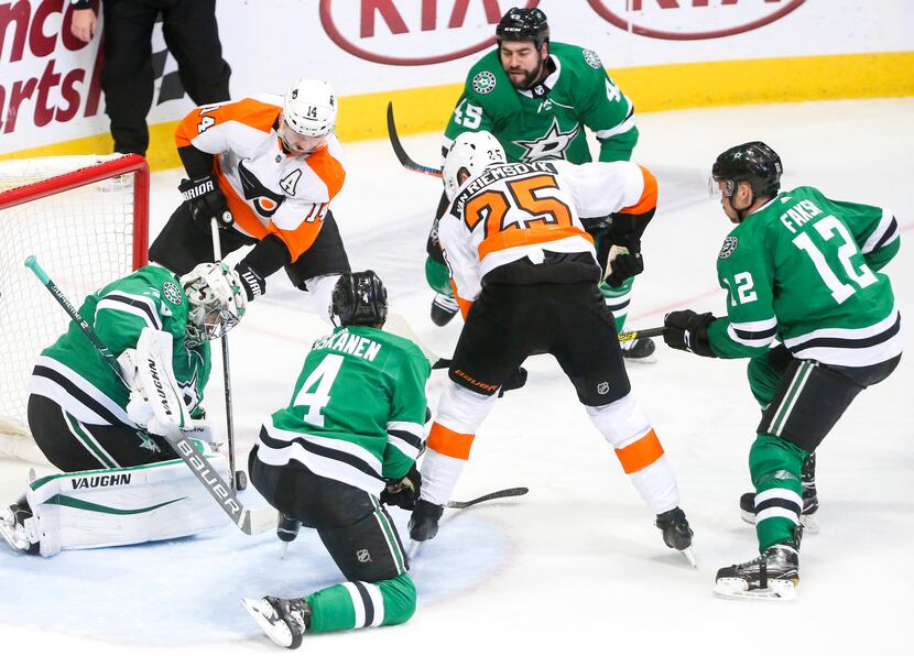 Philadelphia Flyers left wing James van Riemsdyk (25) shoots as Dallas Stars goaltender...