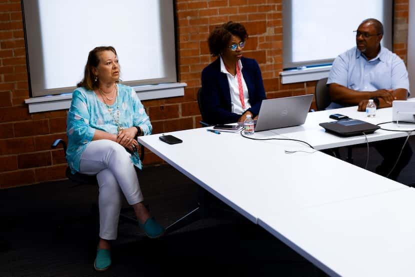 Dallas County District Clerk Felicia Pitre (left), Dallas County Clerk's office employee...