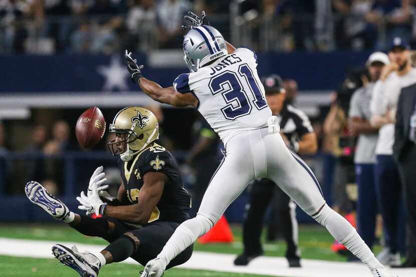 Dallas Cowboys cornerback Byron Jones (31) forces New Orleans Saints wide receiver Michael...