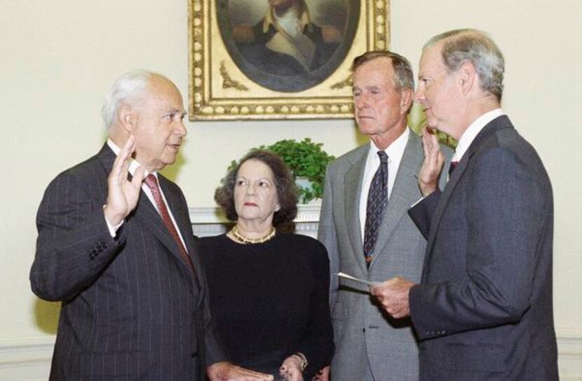 
Robert Strauss, left, is sworn in as ambassador to the Soviet Union by Secretary of State...