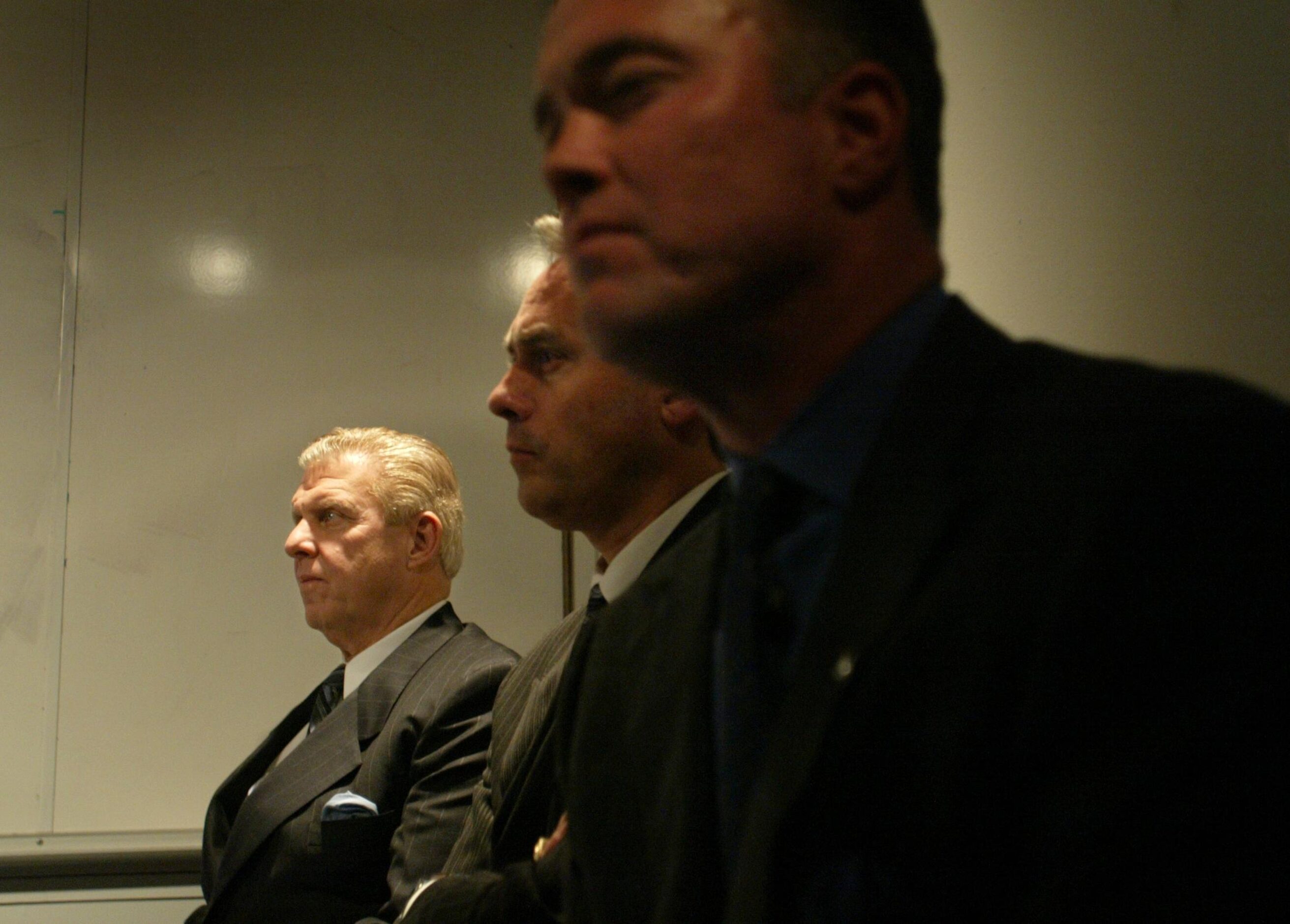 Bill Parcells (left) waits to be introduced as the Dallas Cowboys new head coach alongside...