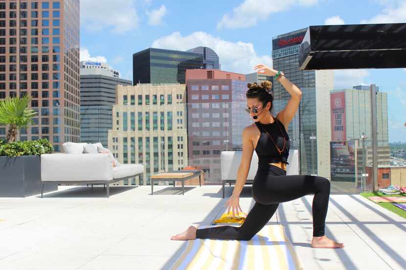 Instructor Leslie Jones conducts free rooftop yoga classes at noon on Wednesdays at the...