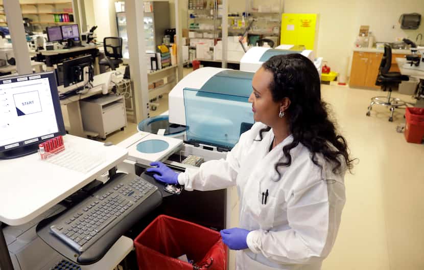 To screen urine for fentanyl, Parkalnd's medical laboratory scientist Dagmawit Worku places...
