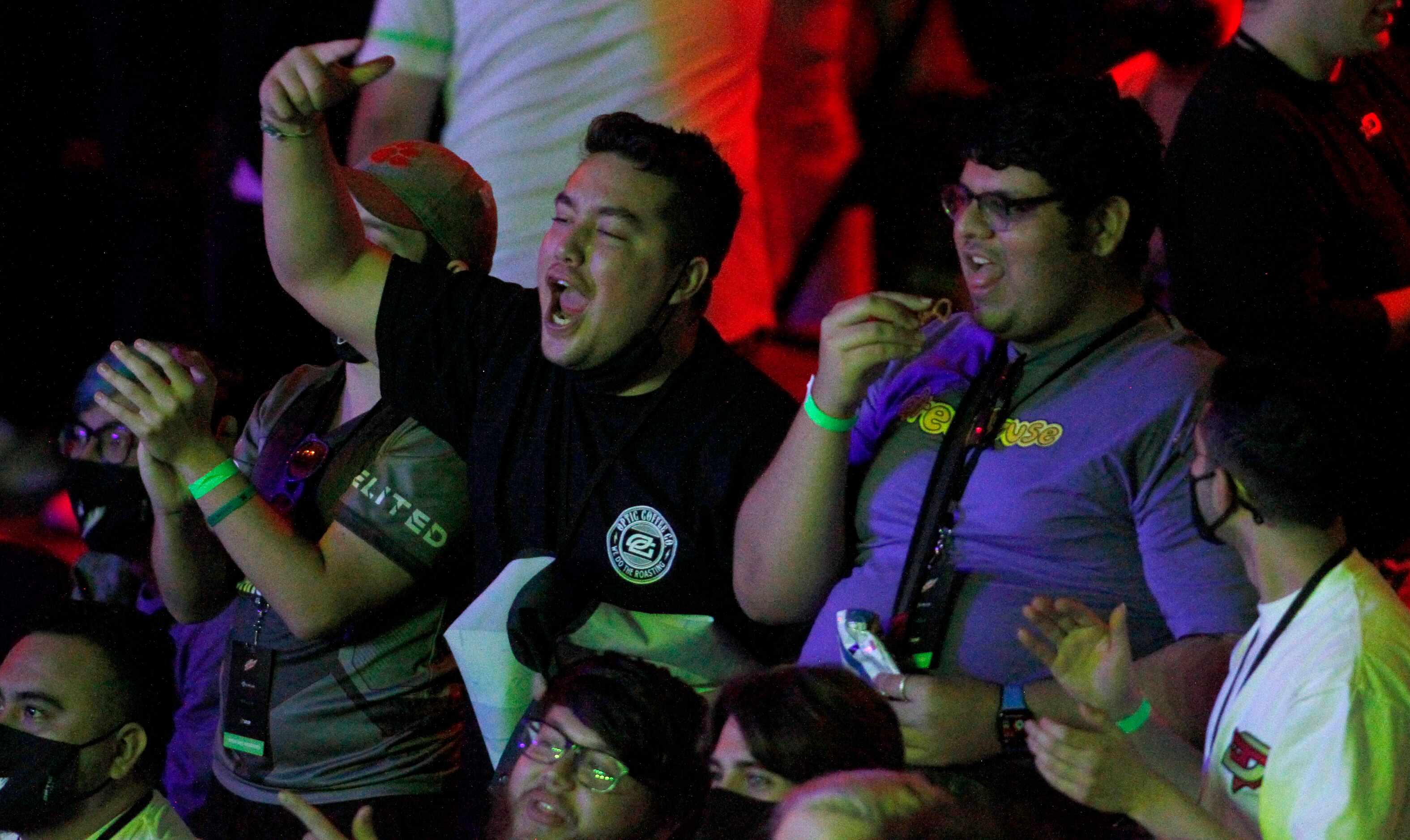 OpTic Texas fans cheer during the team's opening match win over London Royal Ravens, 3-1 to...