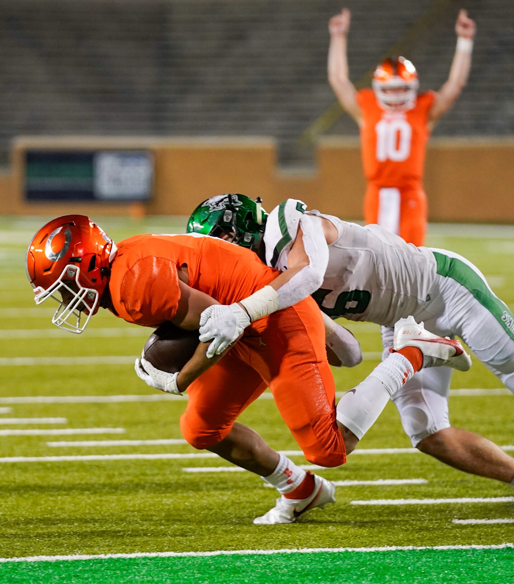 Celina running back Gabe Gayton (11) is stopped just short of the end zone by Iowa Park...