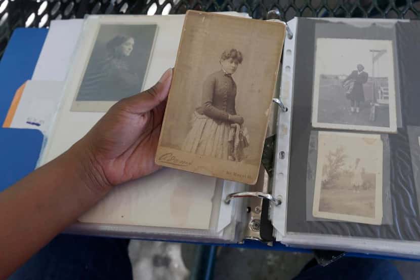 
Relatives shared old photographs are shard during the Miller family reunion at Miller...