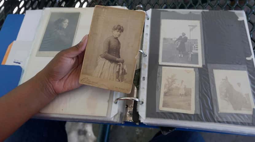 
Relatives shared old photographs are shard during the Miller family reunion at Miller...