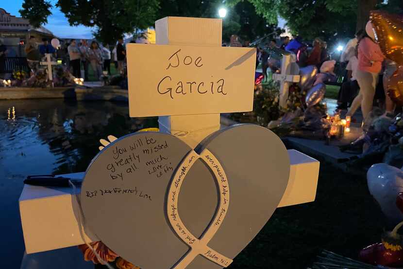 A cross was added Friday with the name of Joe García, the husband of Irma García, the Robb...
