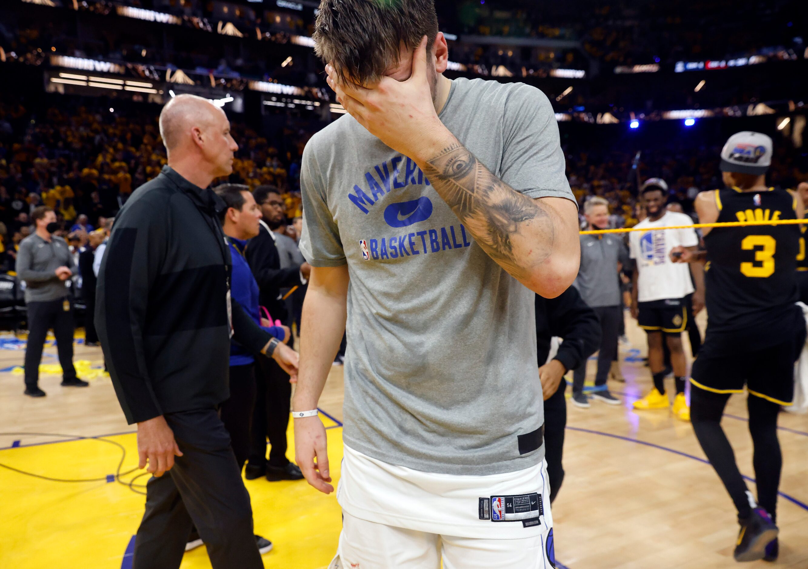 Dallas Mavericks guard Luka Doncic (77) walks off the court following their series loss to...