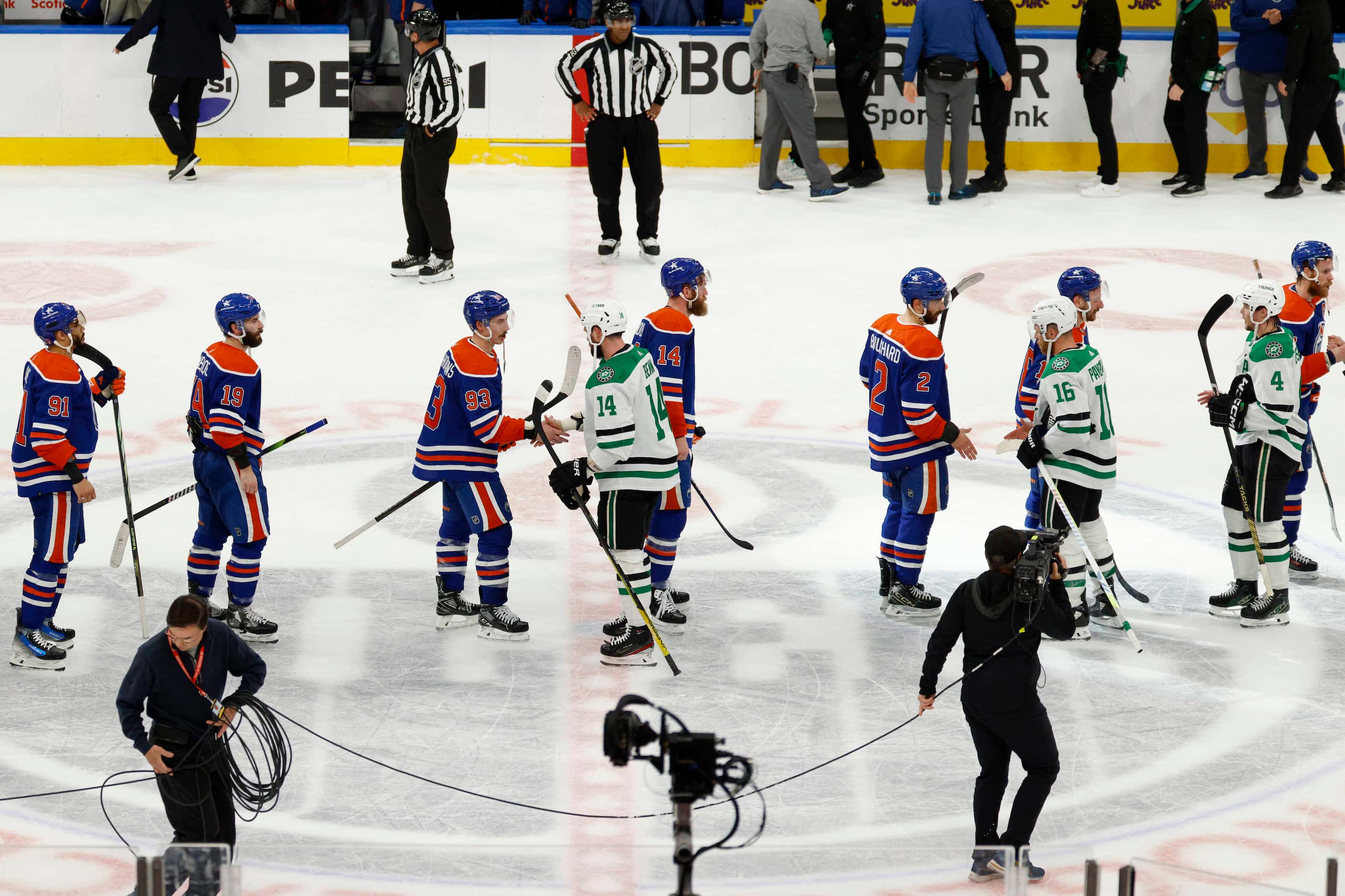 The Dallas Stars and Edmonton Oilers shake hands after Game 6 of the Stanley Cup Western...