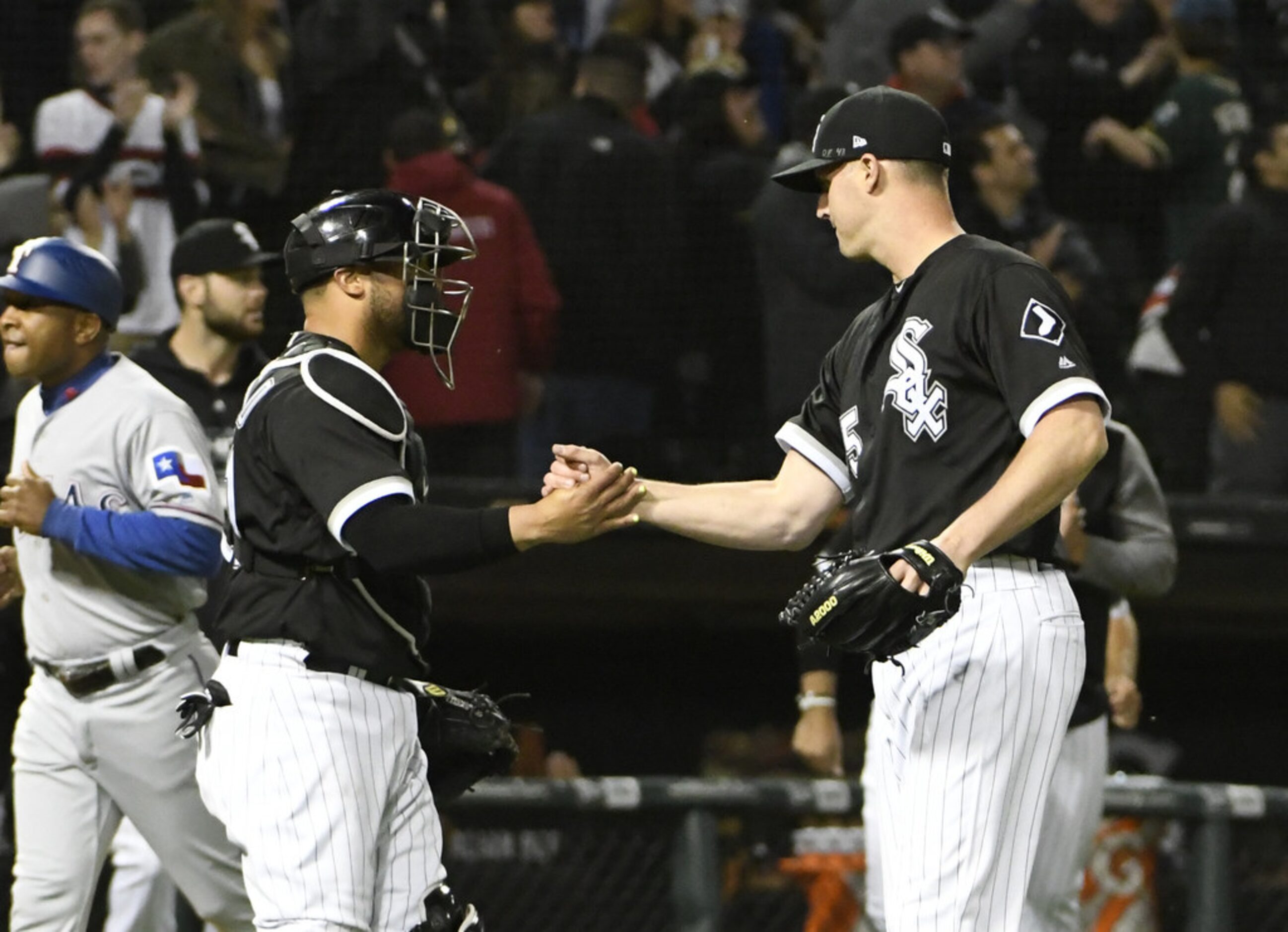 CHICAGO, IL - MAY 17: Welington Castillo (L) and Nate Jones #65 of the Chicago White Sox...