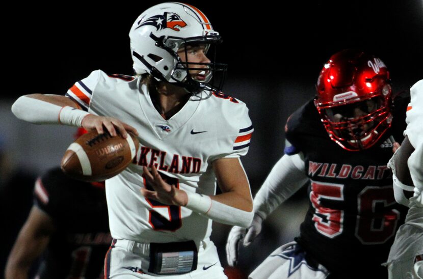 Frisco Wakeland quarterback Brennan Myer (9) sets to pass as Dallas Woodrow Wilson defensive...