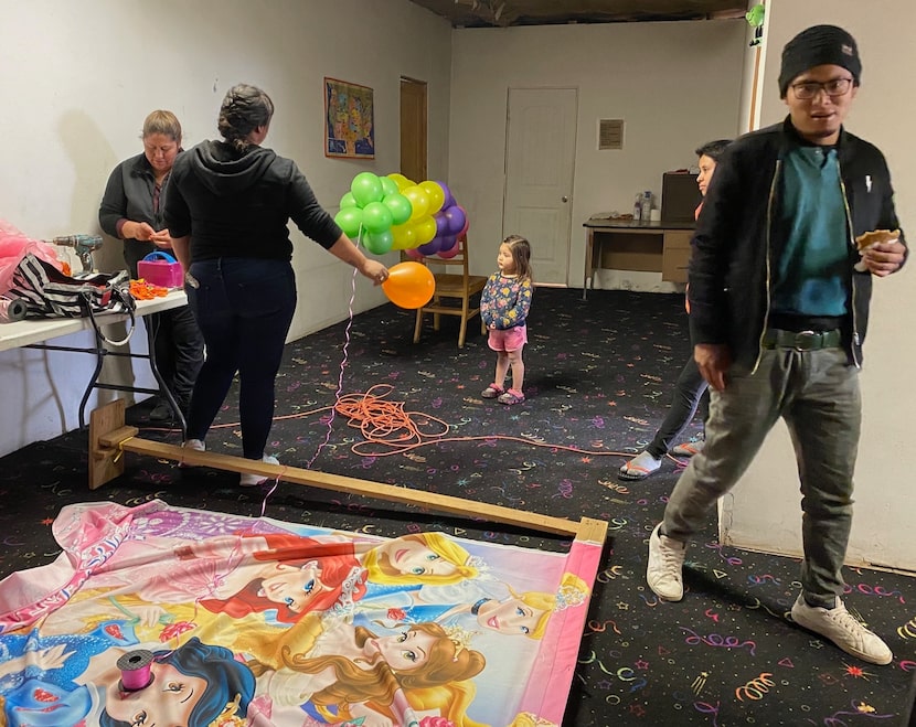 Migrants inside Tierra de Oro shelter in Mexico prepare to celebrate the birthday of one of...