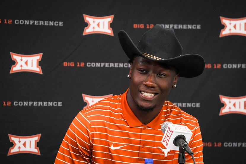 Texas linebacker DeMarvion Overshown speaks to the press during the Big 12 Conference...