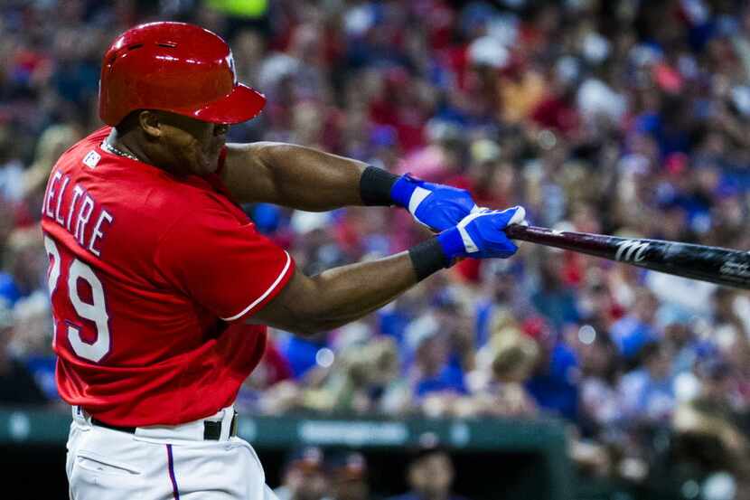 Texas Rangers third baseman Adrian Beltre (29) bats during the sixth inning of their game...
