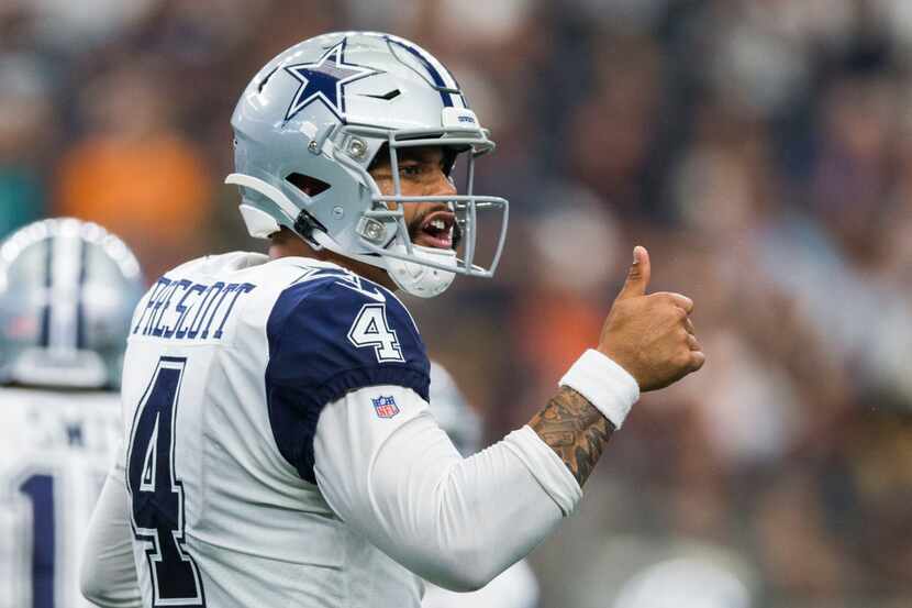 Dallas Cowboys quarterback Dak Prescott (4) gives a thumbs up during the third quarter of an...