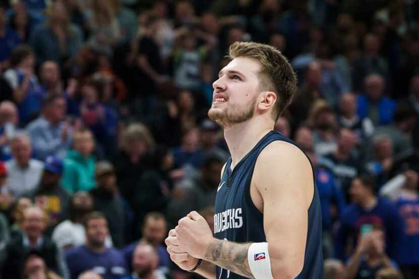 Dallas Mavericks guard Luka Doncic reacts after missing a 3-point attempt to tie the game...