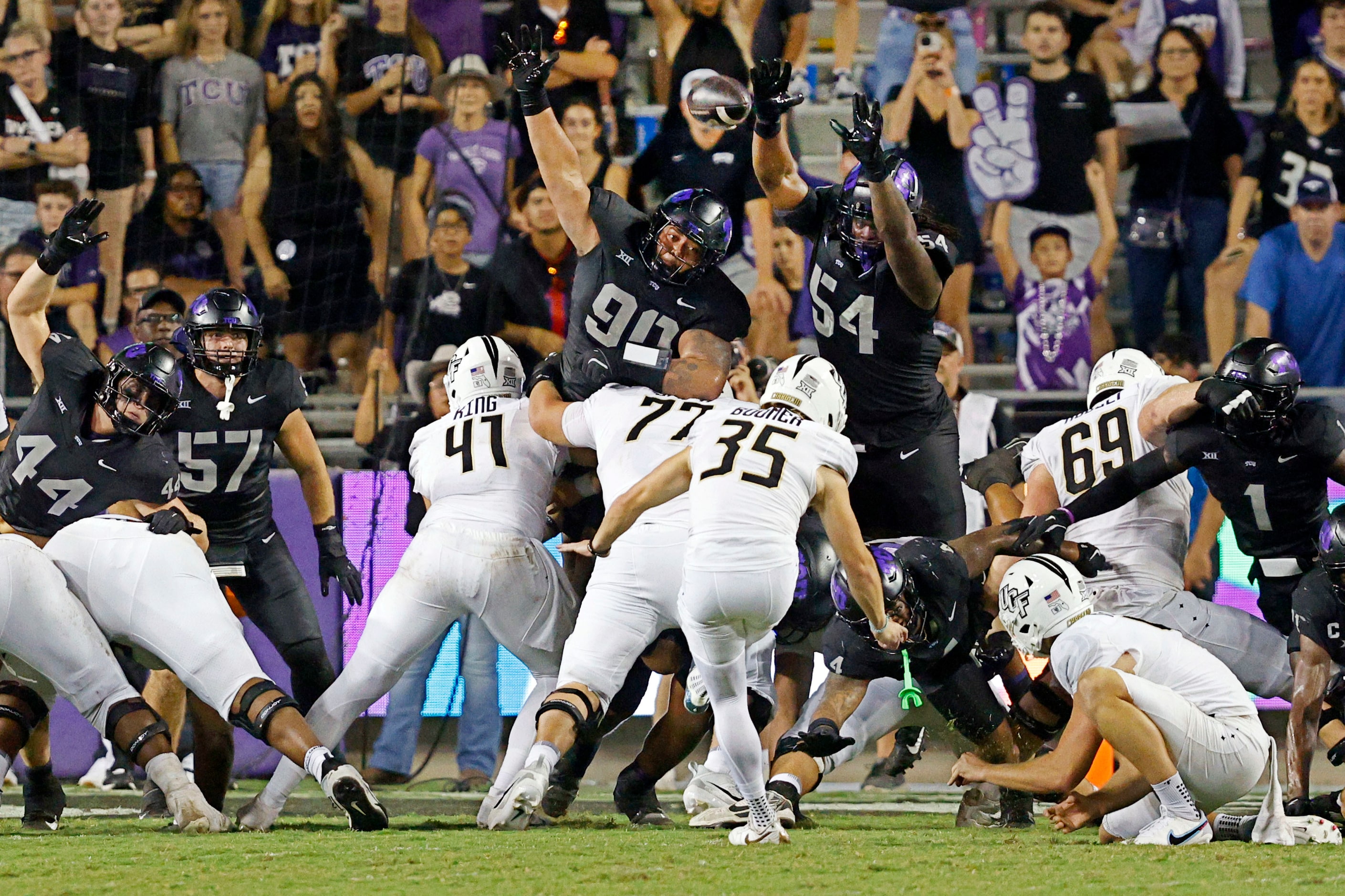 UCF place kicker Colton Boomer (35) scores a field goal against TCU during the second half...