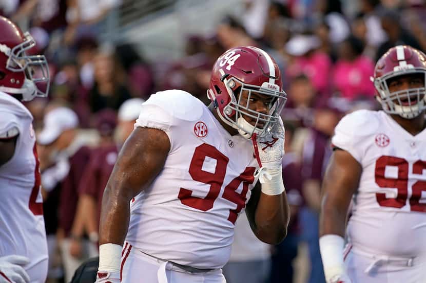 FILE - Alabama defensive lineman Da'Ron Payne (94) warms up before a game against Texas A&M...