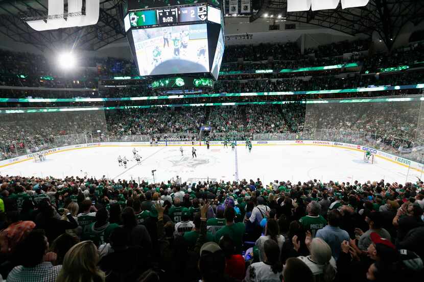 Fans fill the stadium during the third period of a Dallas Stars home opener against the Los...