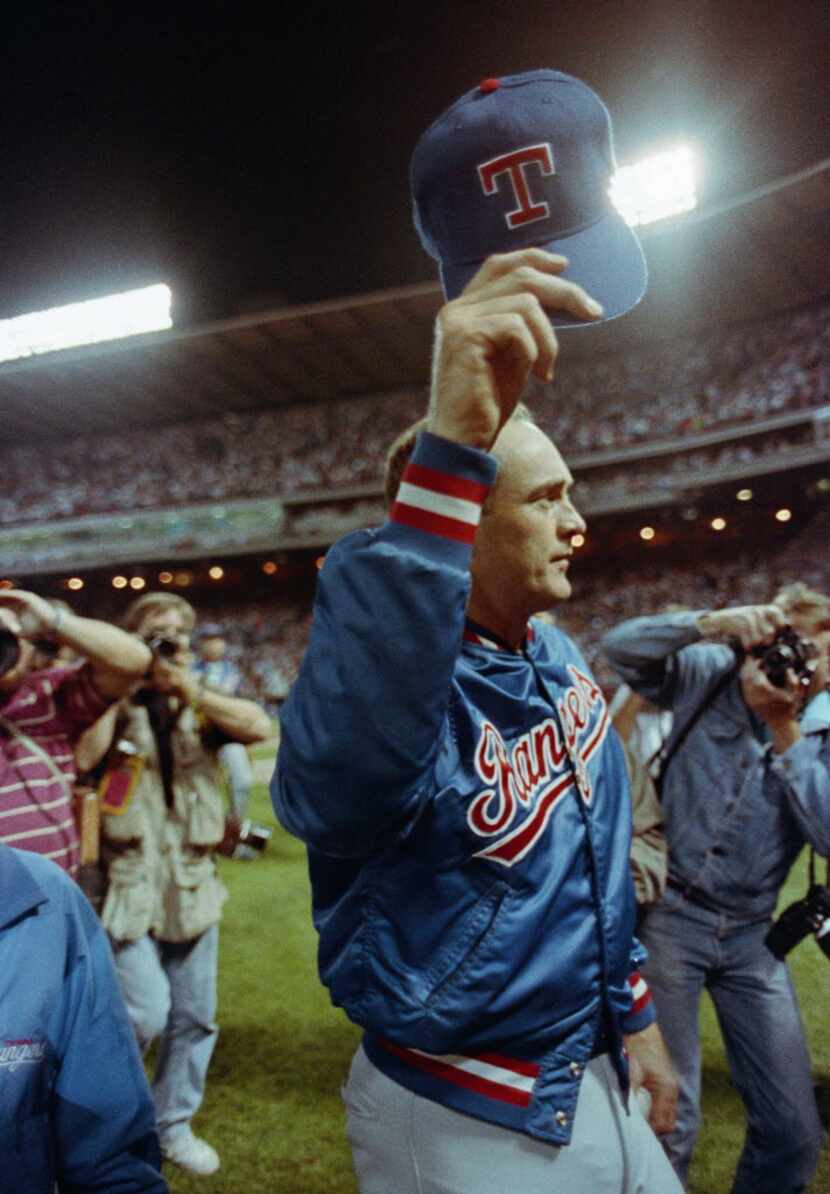 Texas Rangers pitcher Nolan Ryan acknowledges the crowd after the Rangers beat the Milwaukee...