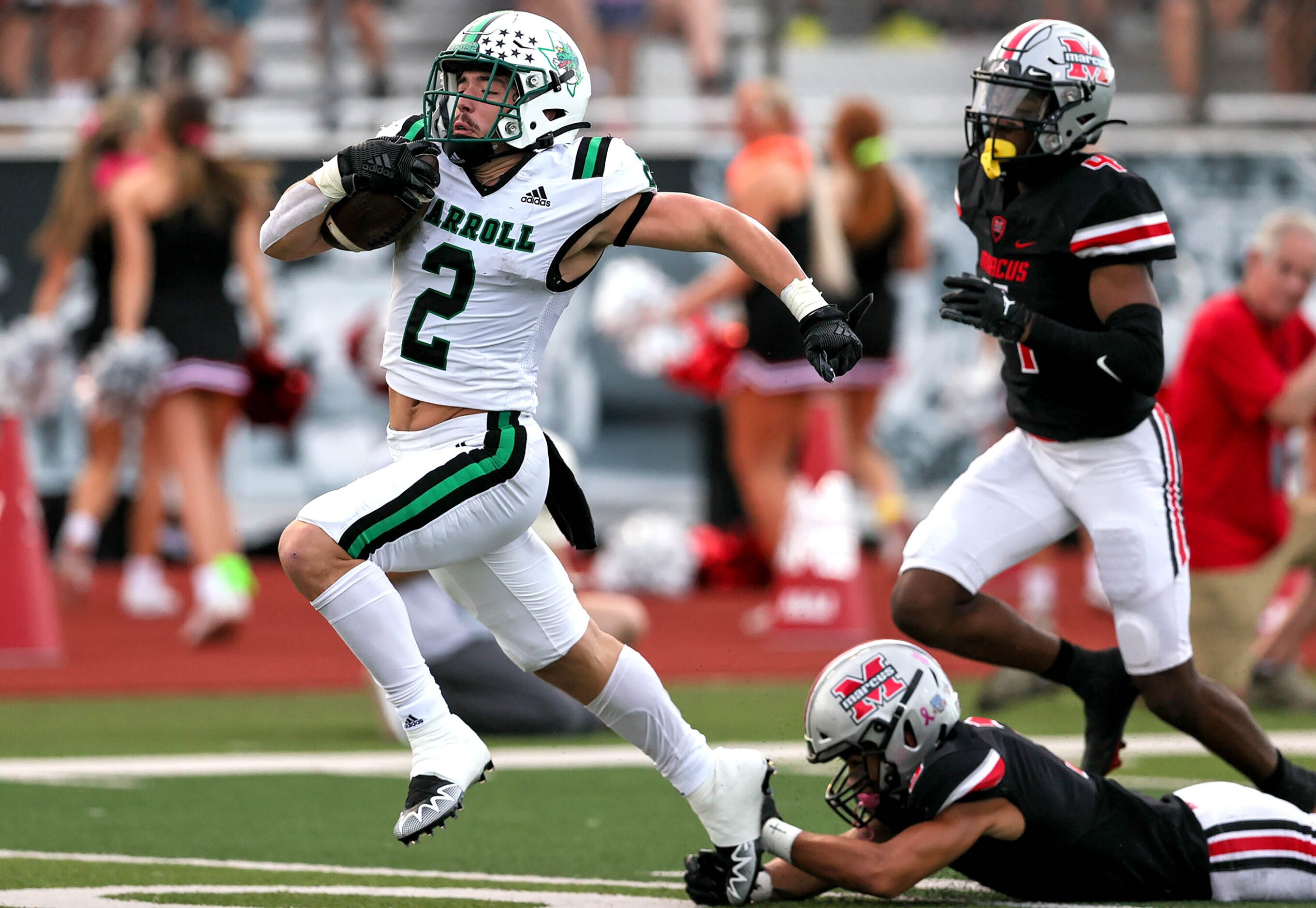 Southlake Carroll running back Owen Allen (2) goes 60 yards for touchdown run against Flower...