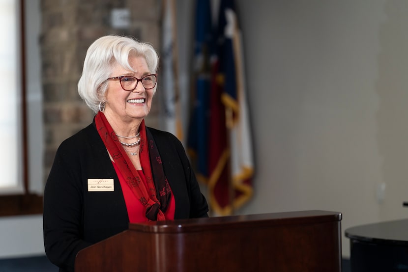 Woman speaking at lectern