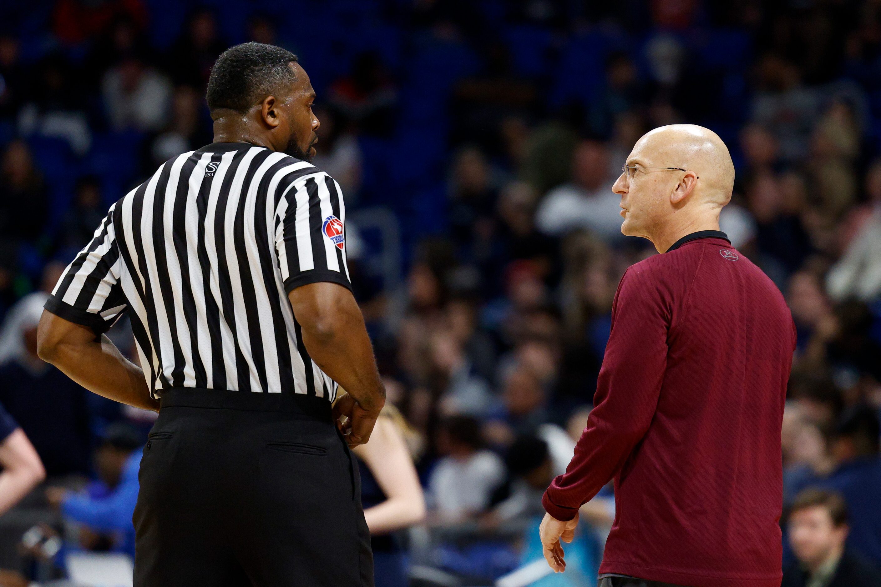 Beaumont United head coach Bobby David Green Jr. speaks with a referee during a timeout in...