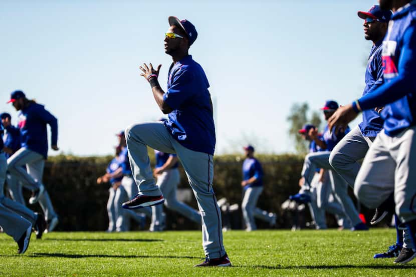 Texas Rangers players during a spring training workout at the team's training facility on...